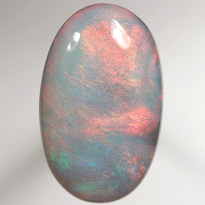 SOLID SEMI BLACK OPAL Huge opal with bright crispy bright red over blue. SEE VIDEO